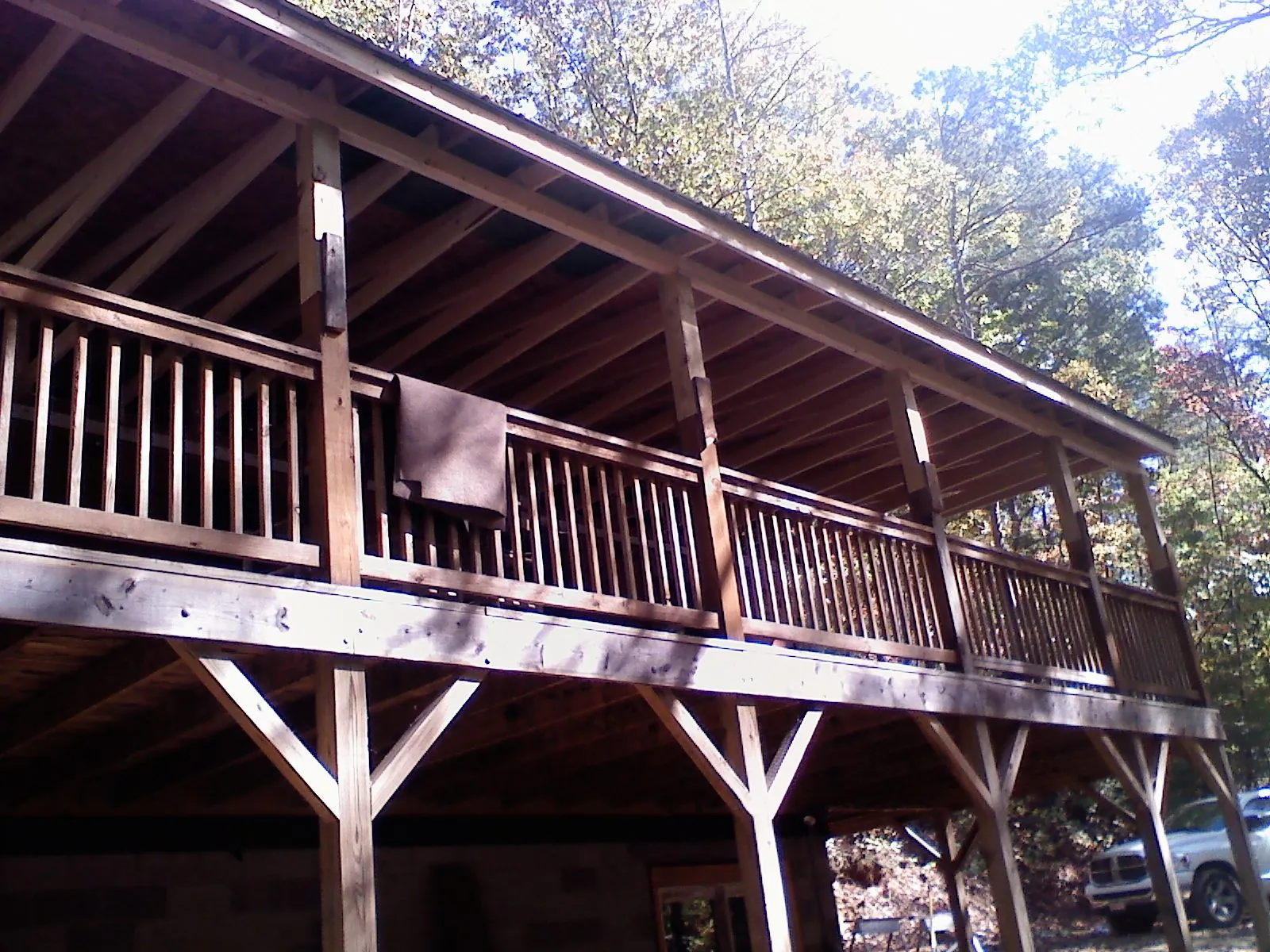 Timber framing under a new elevated porch and deck — Roof Leak Repair in Wheatland by Roofing Brothers